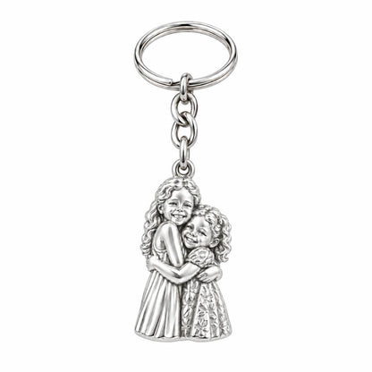 Sisterly Embrace Charm Keychain – silver, front view
