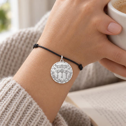 Sisters Garden Bloom Charm and Polyester Cord Bracelet Set – worn on the wrist on a black cord bracelet