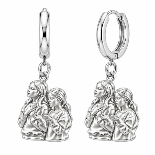 Sisters in Prayer Huggie Charm Earrings – silver, front view