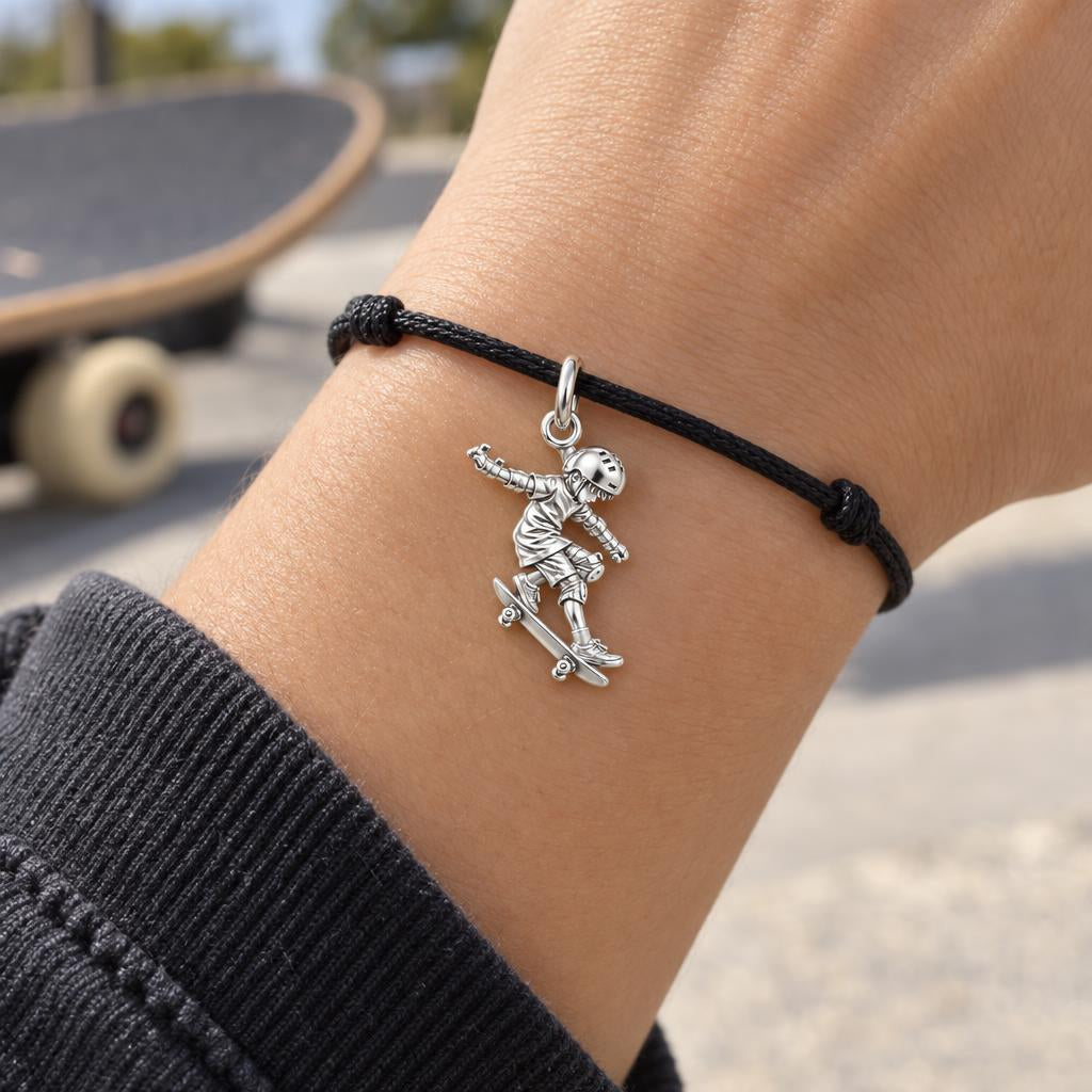Skater in Motion Charm Bracelet – Personalized Son Gift – worn on the wrist on a black cord bracelet