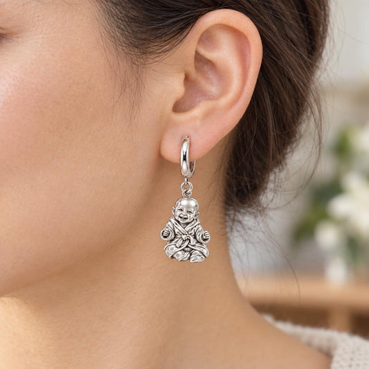 Smiling Baby Monk Huggie Charm Earrings – worn / in use