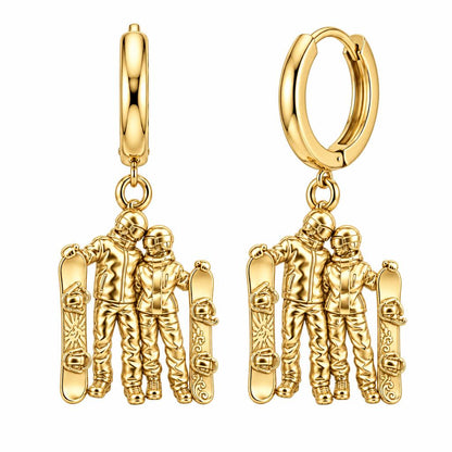 Snowboard Couple in Gear Huggie Charm Earrings – 18K gold, front view