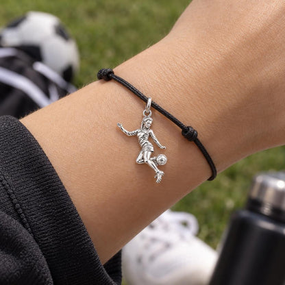Soccer Girl in Motion Charm Bracelet – Personalized Athlete Gift – worn on the wrist on a black cord bracelet