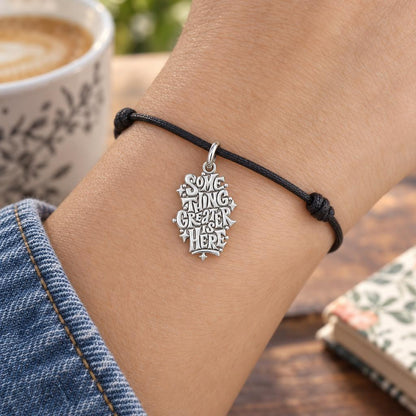 Something Greater Is Here Charm Bracelet – Personalized Mom Gift – worn on the wrist on a black cord bracelet
