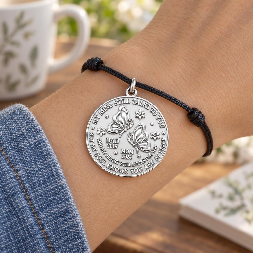 Soul at Peace Butterfly Charm Bracelet – Personalized Memorial Gift – worn on the wrist on a black cord bracelet