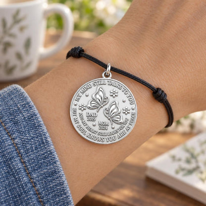 Soul at Peace Butterfly Charm Bracelet – Personalized Memorial Gift – worn on the wrist on a black cord bracelet