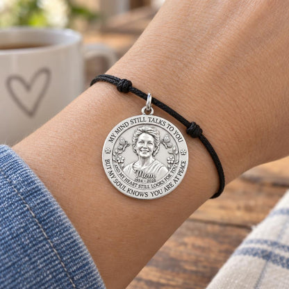 Soul Knows Peace Charm Bracelet – Personalized Memorial Gift – worn on the wrist on a black cord bracelet