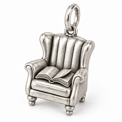Cozy Reading Chair Charm | macro | 63c4bb3e4f06d89c751d5402f8c769ab431d6af0b318064dffc8e4c010d72a31