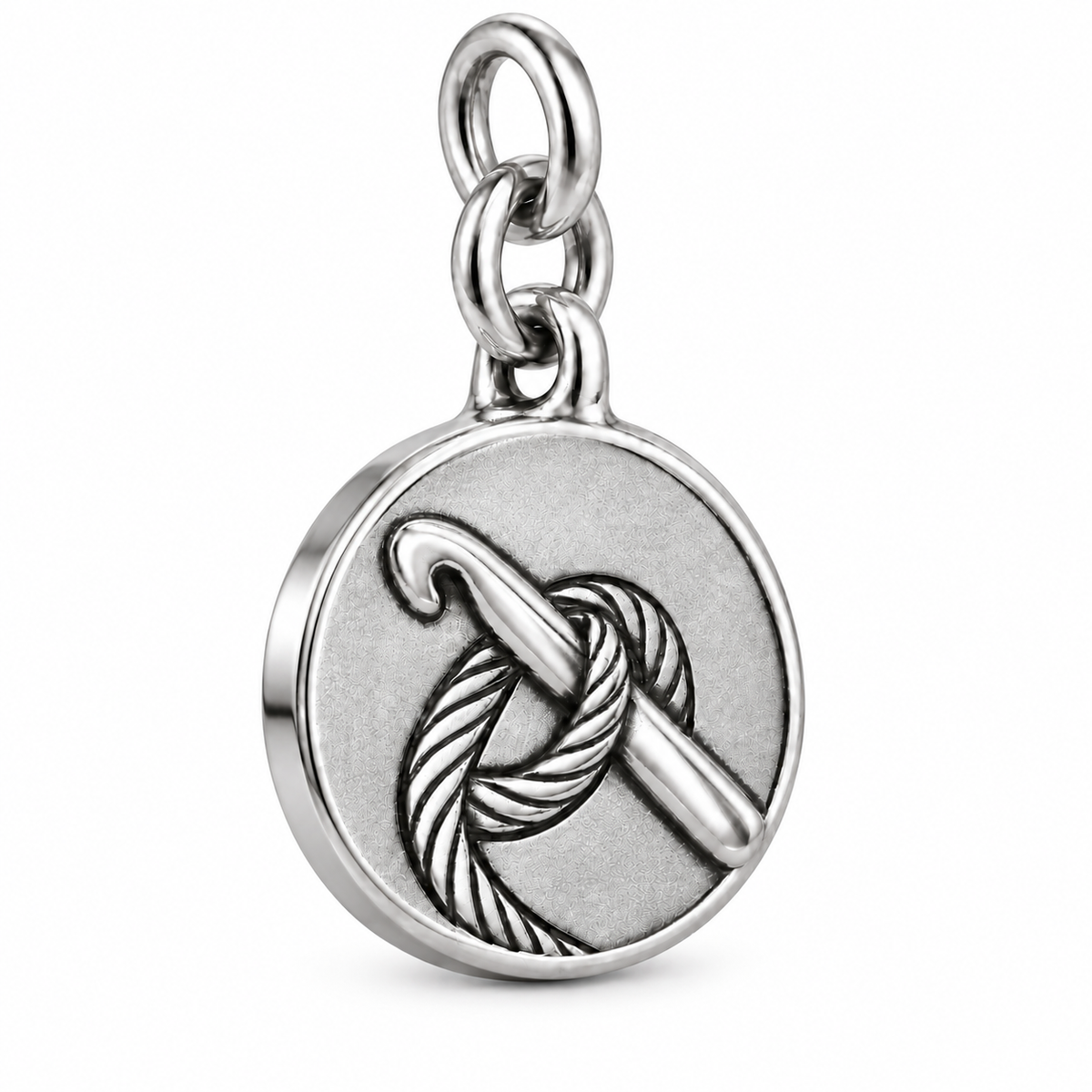 Hook and Loop Crochet Medallion Charm | macro | 749b11b5fe0d66251c8a4dc7f0e30c9a6165fc4c55336a561f16b0b1c8997fec