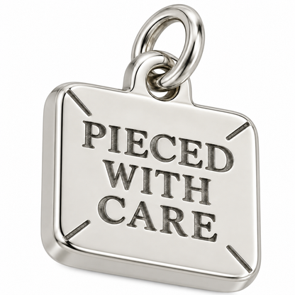 Pieced with Care Engraved Quilting Charm | macro | 8a00e4795ea68463d099e53be7001ef9fcd2dde6bc8f19d4db52d8ff167bf586