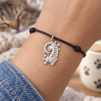 Starlight Stretchy Cat Charm Bracelet – Personalized Cat Mom Gift – worn on the wrist on a black cord bracelet