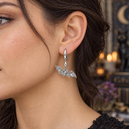 Starry Night Bat Huggie Charm Earrings – worn / in use
