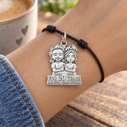 Still Going Strong Charm Bracelet – Personalized Couple Gift – worn on the wrist on a black cord bracelet