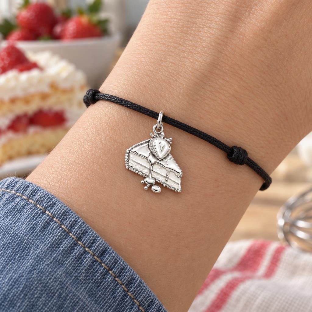 Strawberry Shortcake Charm Bracelet – Personalized Baker Gift – worn on the wrist on a black cord bracelet