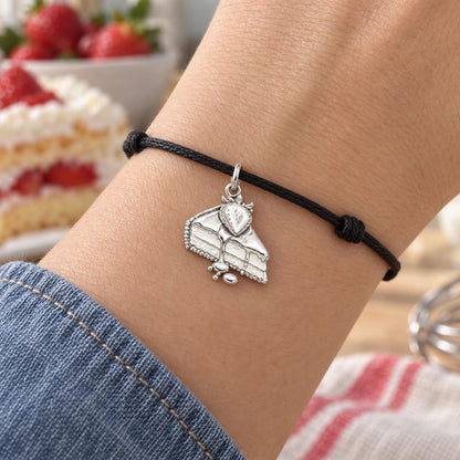 Strawberry Shortcake Charm Bracelet – Personalized Baker Gift – worn on the wrist on a black cord bracelet