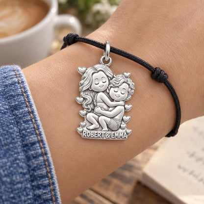 Sweet Couple Embrace Charm Bracelet – Personalized Couple Gift – worn on the wrist on a black cord bracelet