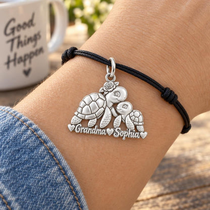 Tender Sea Turtle Charm Bracelet – Personalized Grandma Gift – worn on the wrist on a black cord bracelet