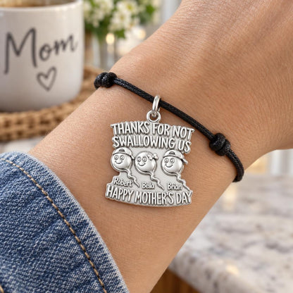 Thanks For Not Swallowing Us Charm Bracelet – Personalized Mom Gift – worn on the wrist on a black cord bracelet