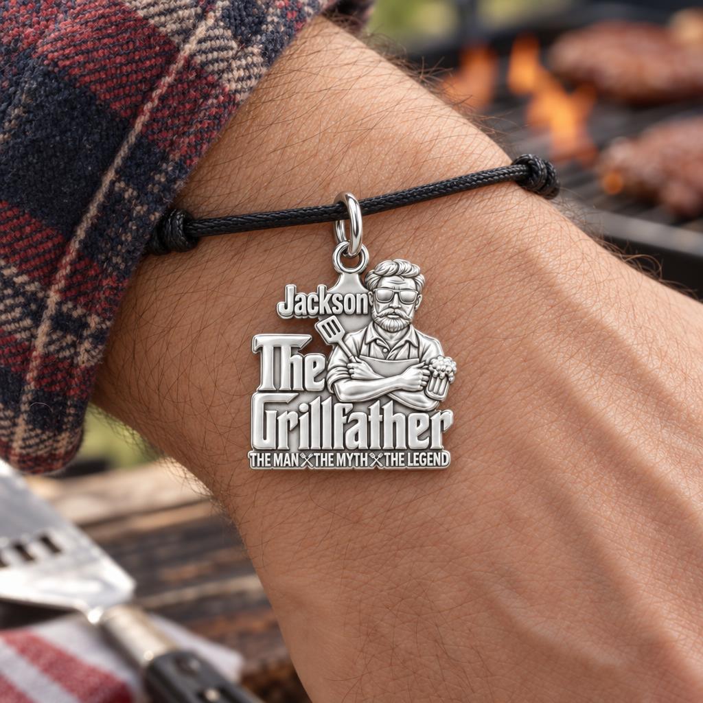 The Grillfather Charm Bracelet – Personalized Dad Gift – worn on the wrist on a black cord bracelet