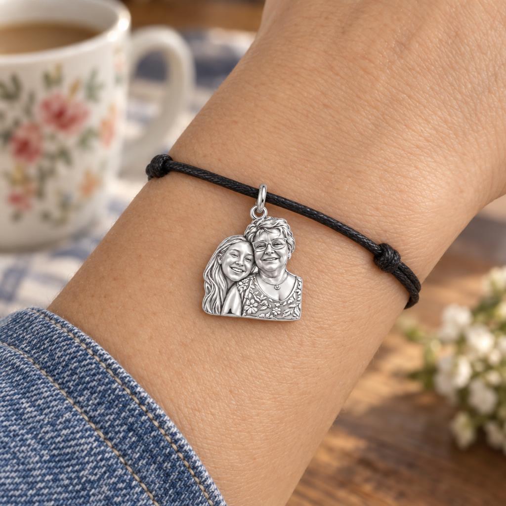 To My Grandma: Grandma's Loving Embrace Charm Bracelet – worn on the wrist on a black cord bracelet