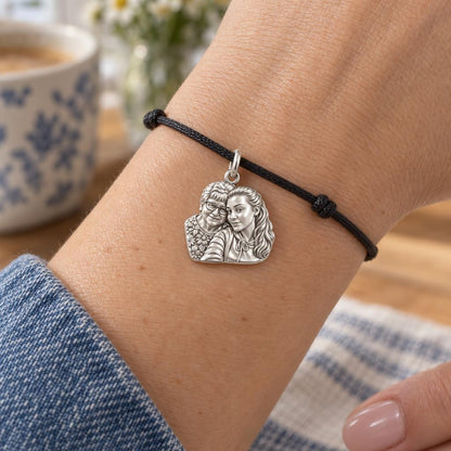 To My Grandma: Grandma's Loving Embrace Charm Bracelet – worn on the wrist on a black cord bracelet
