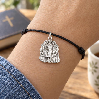 To My Prayer Sister: Together In Faith Charm Bracelet – worn on the wrist on a black cord bracelet