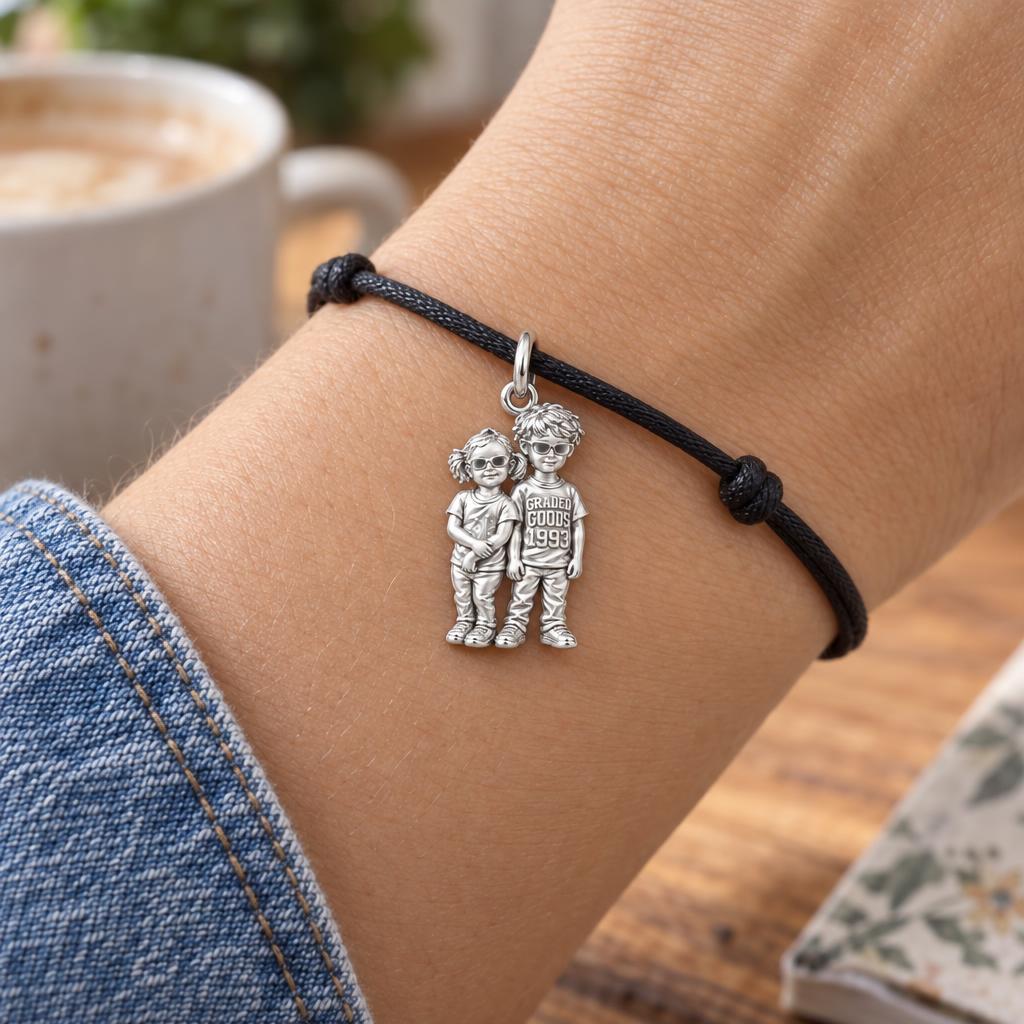 Tucked In Siblings Charm Bracelet – Personalized Mom Gift – worn on the wrist on a black cord bracelet