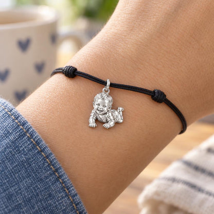 Tummy Time Joy Charm Bracelet – Personalized Mom Gift – worn on the wrist on a black cord bracelet