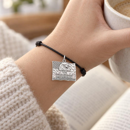 U.S. Veteran Honor Charm and Polyester Cord Bracelet Set – worn on the wrist on a black cord bracelet