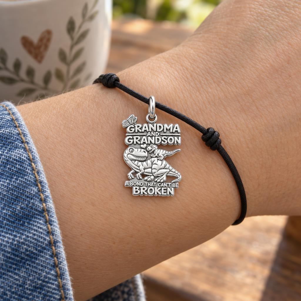 Unbroken Bond Dinosaur Charm Bracelet – Personalized Grandma Gift – worn on the wrist on a black cord bracelet
