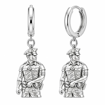 Valiant Hero in Uniform Huggie Charm Earrings – silver, front view