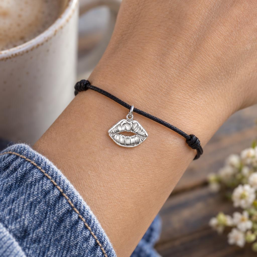 Velvet Kiss Charm Bracelet – Personalized Couple Gift – worn on the wrist on a black cord bracelet