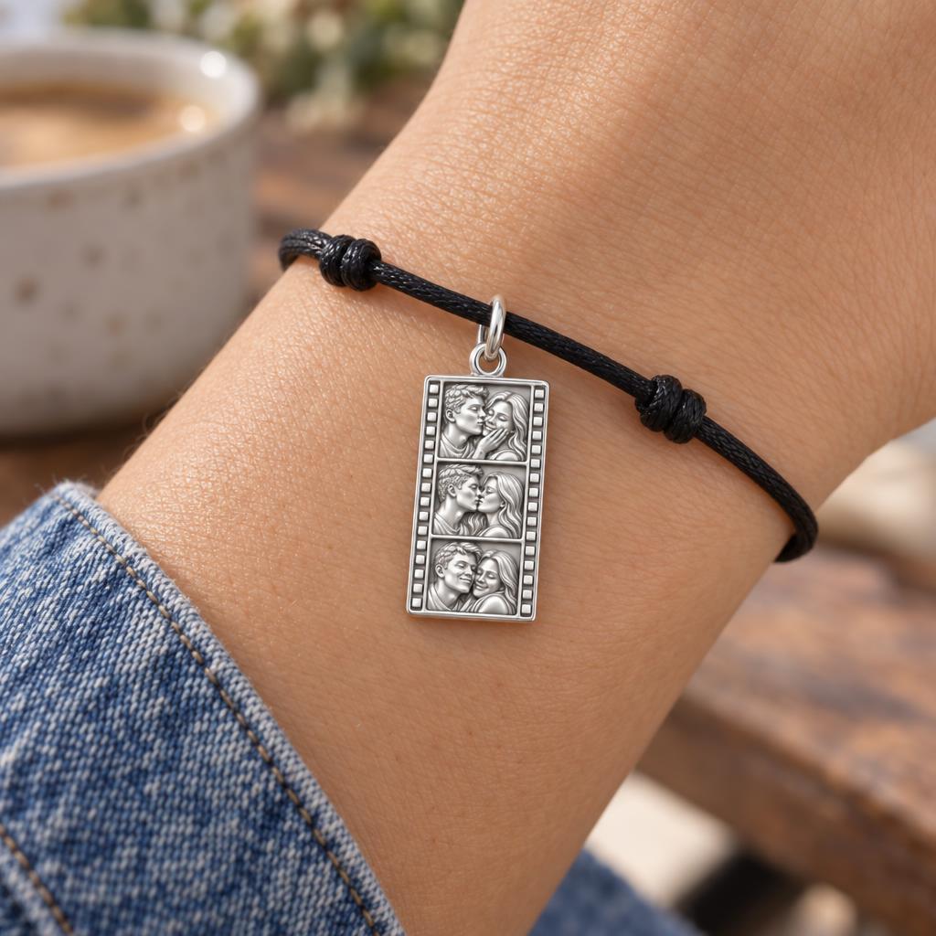 Vintage Film Strip Charm Bracelet – Personalized Couple Gift – worn on the wrist on a black cord bracelet
