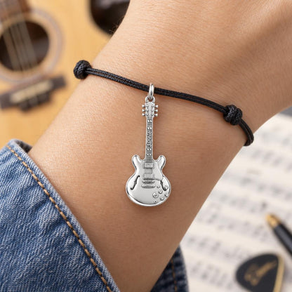 Vintage Hollow Body Guitar Charm Bracelet – Personalized Musician Gift – worn on the wrist on a black cord bracelet