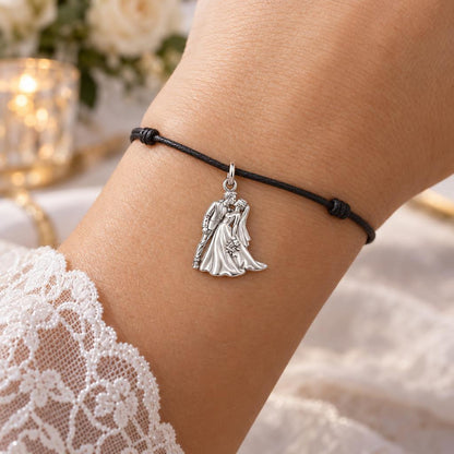 Wedding First Kiss Charm Bracelet – Personalized Couple Gift – worn on the wrist on a black cord bracelet