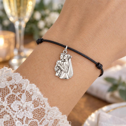 Wedding Toast Silhouette Charm Bracelet – Personalized Couple Gift – worn on the wrist on a black cord bracelet