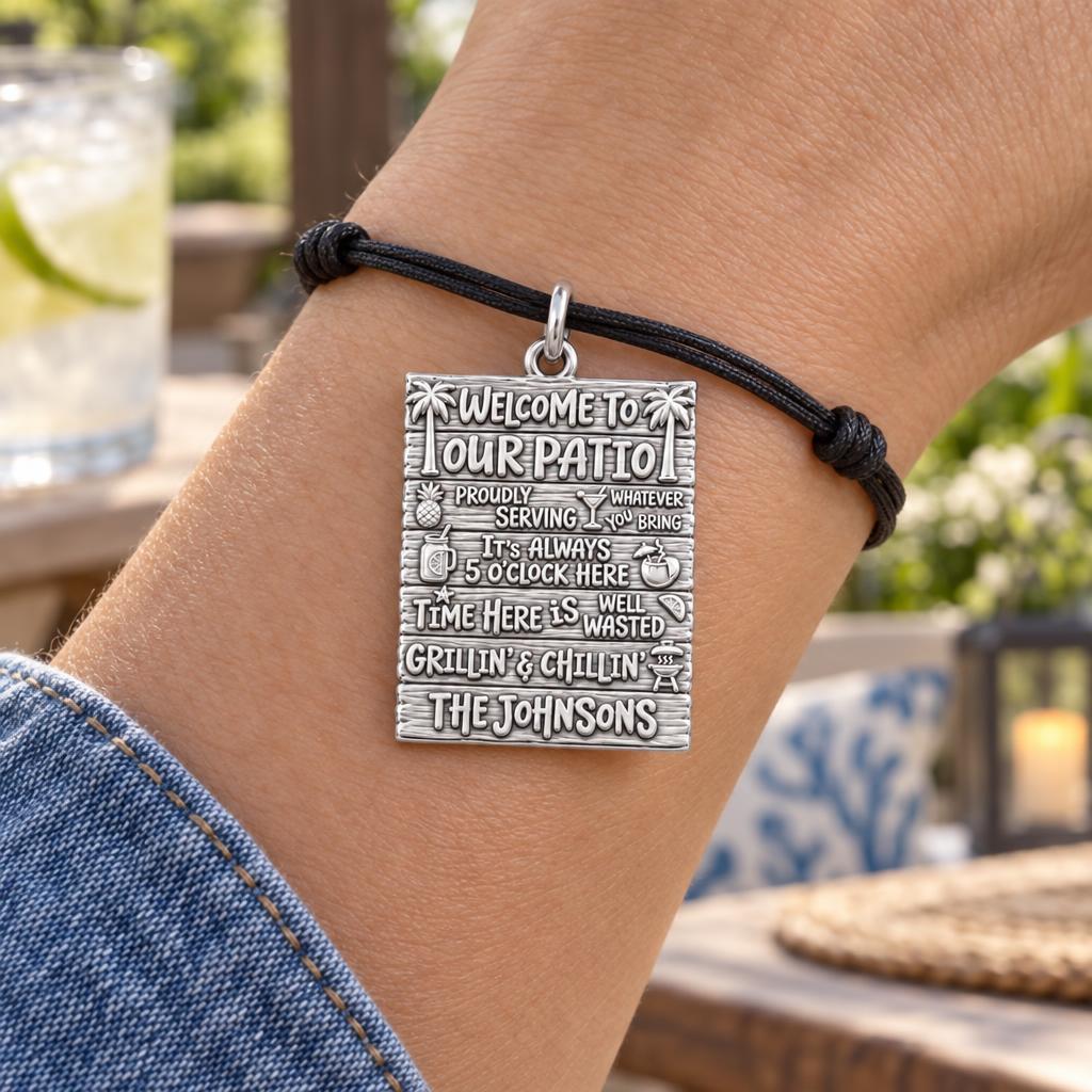 Welcome To Our Patio Charm Bracelet – Personalized Couple Gift – worn on the wrist on a black cord bracelet