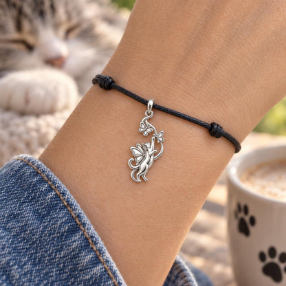 Whimsical Fairy Cat Charm Bracelet – Personalized Cat Mom Gift – worn on the wrist on a black cord bracelet
