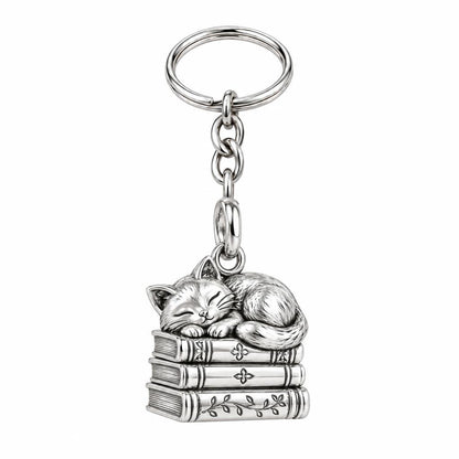 Whiskers & Chapters Charm Keychain – silver, front view