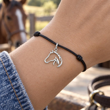 Wild and Free Horse Silhouette Charm Bracelet – Personalized Horse – worn on the wrist on a black cord bracelet