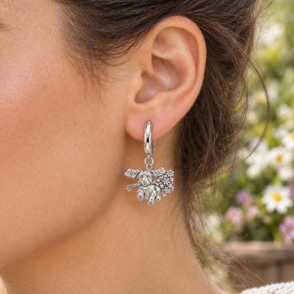 Wildflower Delivery Pup Huggie Charm Earrings – worn / in use