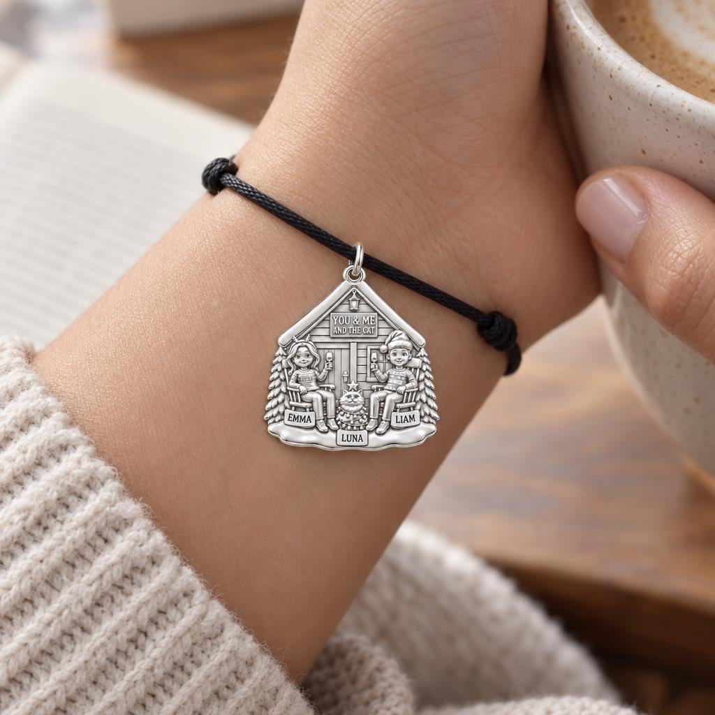 Winter Cabin Cats and Cocoa Charm and Polyester Cord Bracelet Set – worn on the wrist on a black cord bracelet