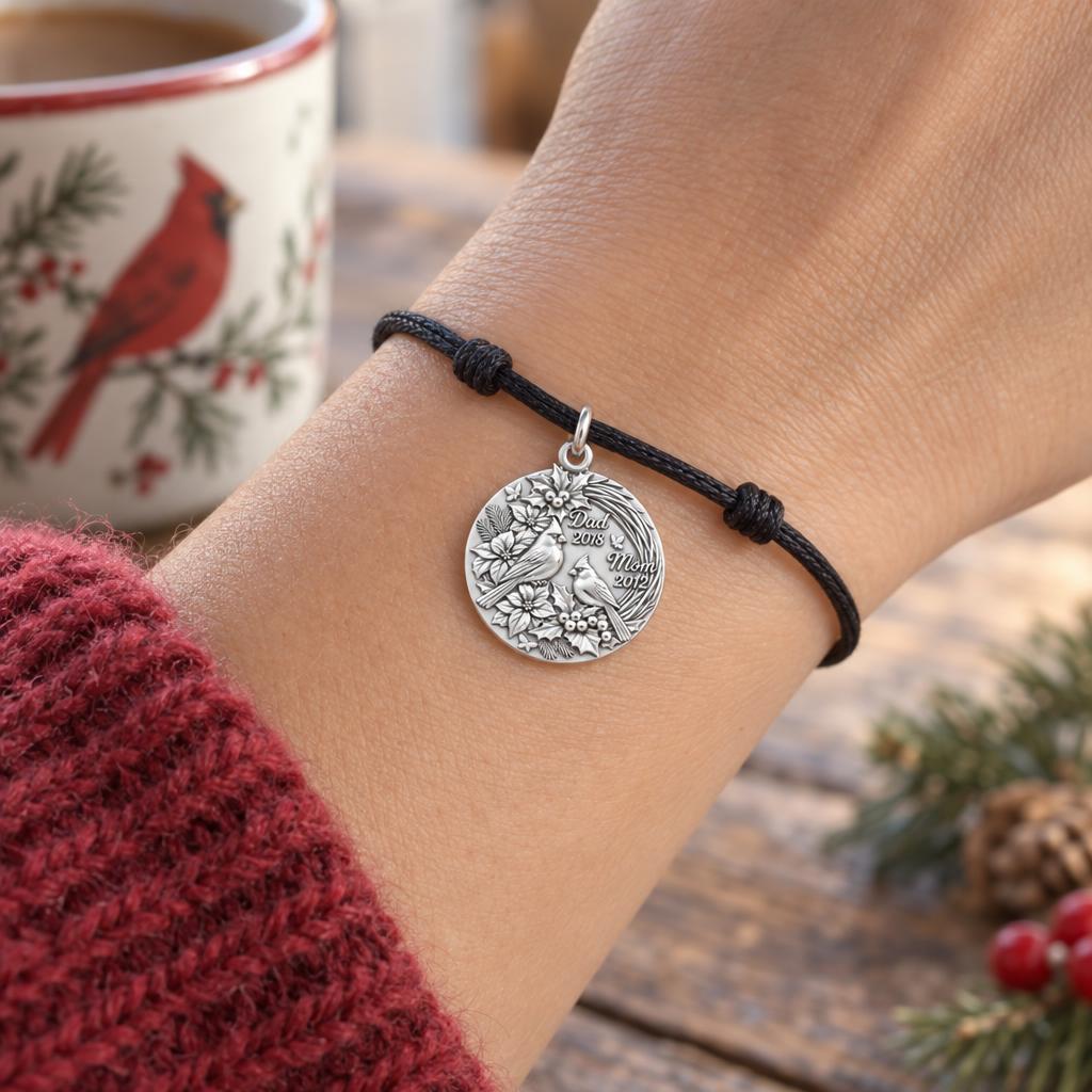 Winter Cardinal Pair Charm Bracelet – Personalized Mom Gift – worn on the wrist on a black cord bracelet