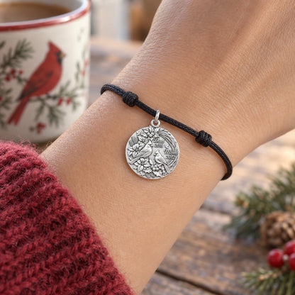 Winter Cardinal Pair Charm Bracelet – Personalized Mom Gift – worn on the wrist on a black cord bracelet