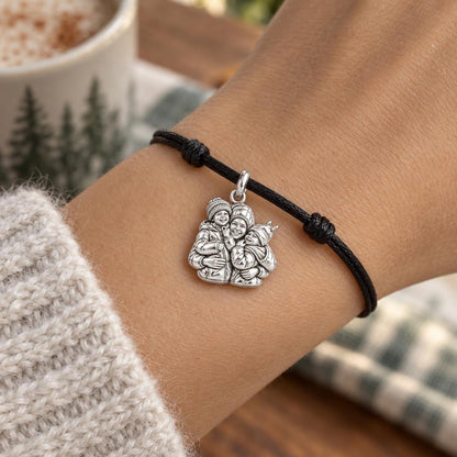 Winter Hug Portrait Charm Bracelet – Personalized Mom Gift – worn on the wrist on a black cord bracelet