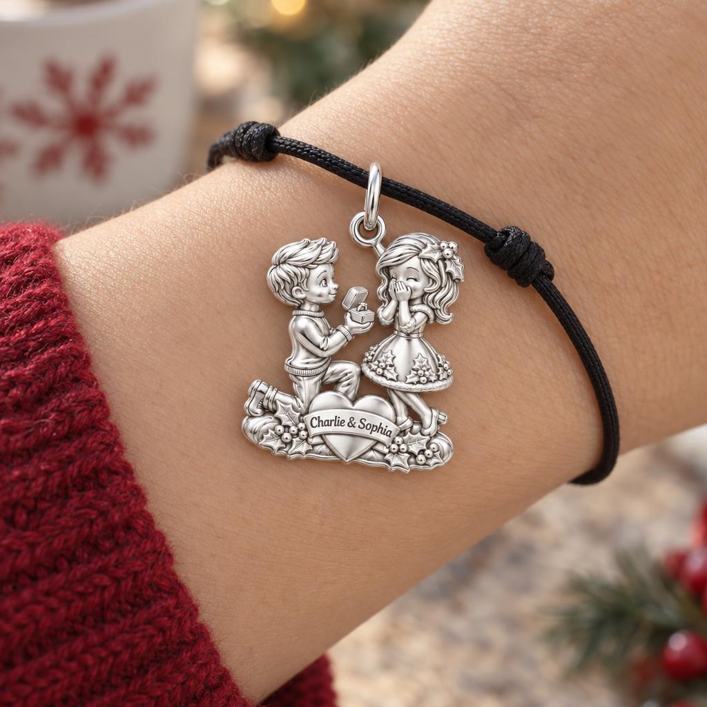 Winter Proposal Heart Charm Bracelet – Personalized Couple Gift – worn on the wrist on a black cord bracelet