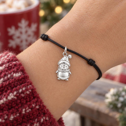 Winter Waddle Penguin Charm Bracelet – Personalized Daughter Gift – worn on the wrist on a black cord bracelet