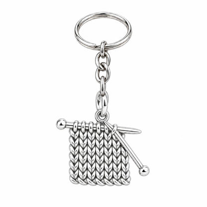 Work in Progress Knitting Charm Keychain – silver, front view