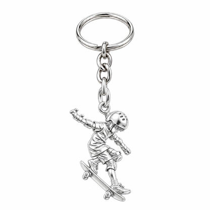 Young Skater in Motion Charm Keychain – silver, front view